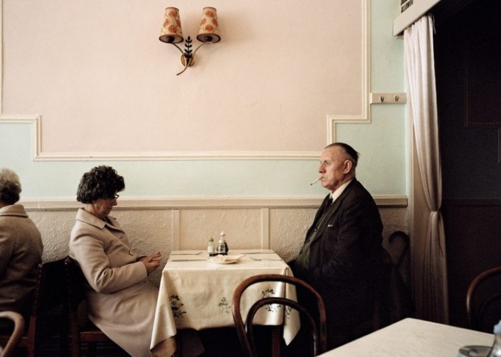 GB. England. New Brighton. A couple in a cafe. 1985.